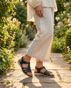 Women's orthopedic sandals worn outdoors, lifestyle