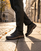 Men's leather comfort dress shoes worn on a sidewalk, lifestyle