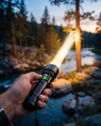 USB rechargeable flashlight beam outdoors, lifestyle